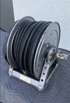 Hannay Electric Rewind Pressure Washer Reel With Hose. Fixed Price $479.99.